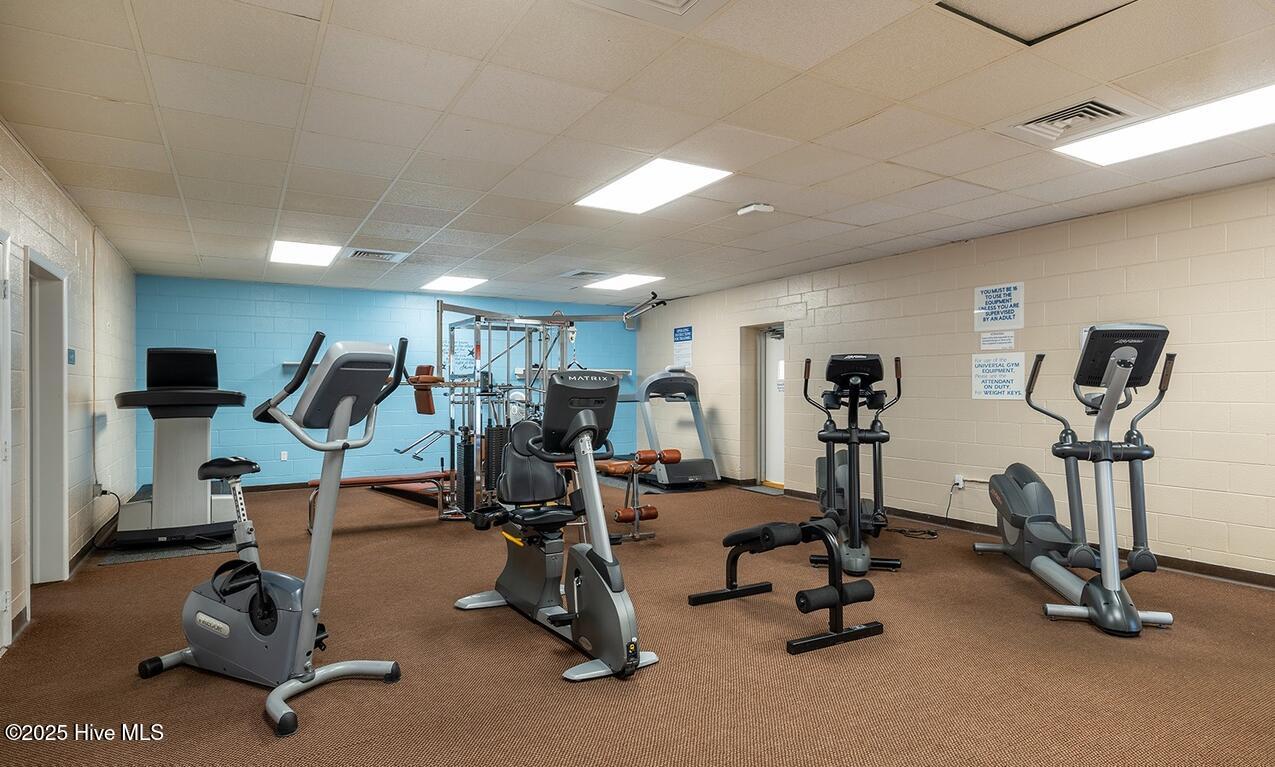1505 Salter Path Road, Unit 325 Indian Beach, NC 28512 - Photo 33 of 46 Fitness room, game room, lockers, raquet