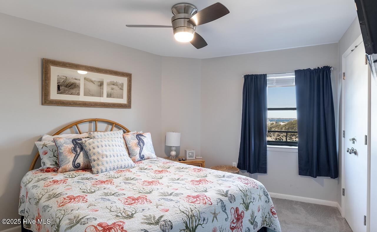 1505 Salter Path Road, Unit 325 Indian Beach, NC 28512 - Photo 10 of 46 bedroom with a queen bed