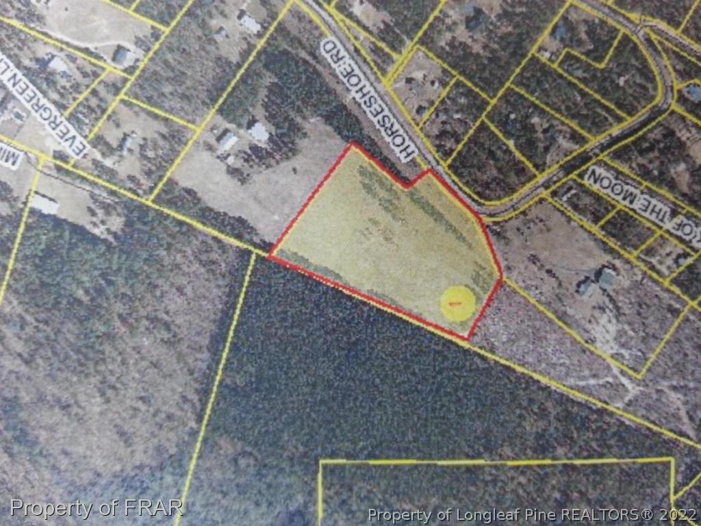 Horseshoe Road Aberdeen, NC 28315 - Photo 2 of 2 an aerial view of a house
