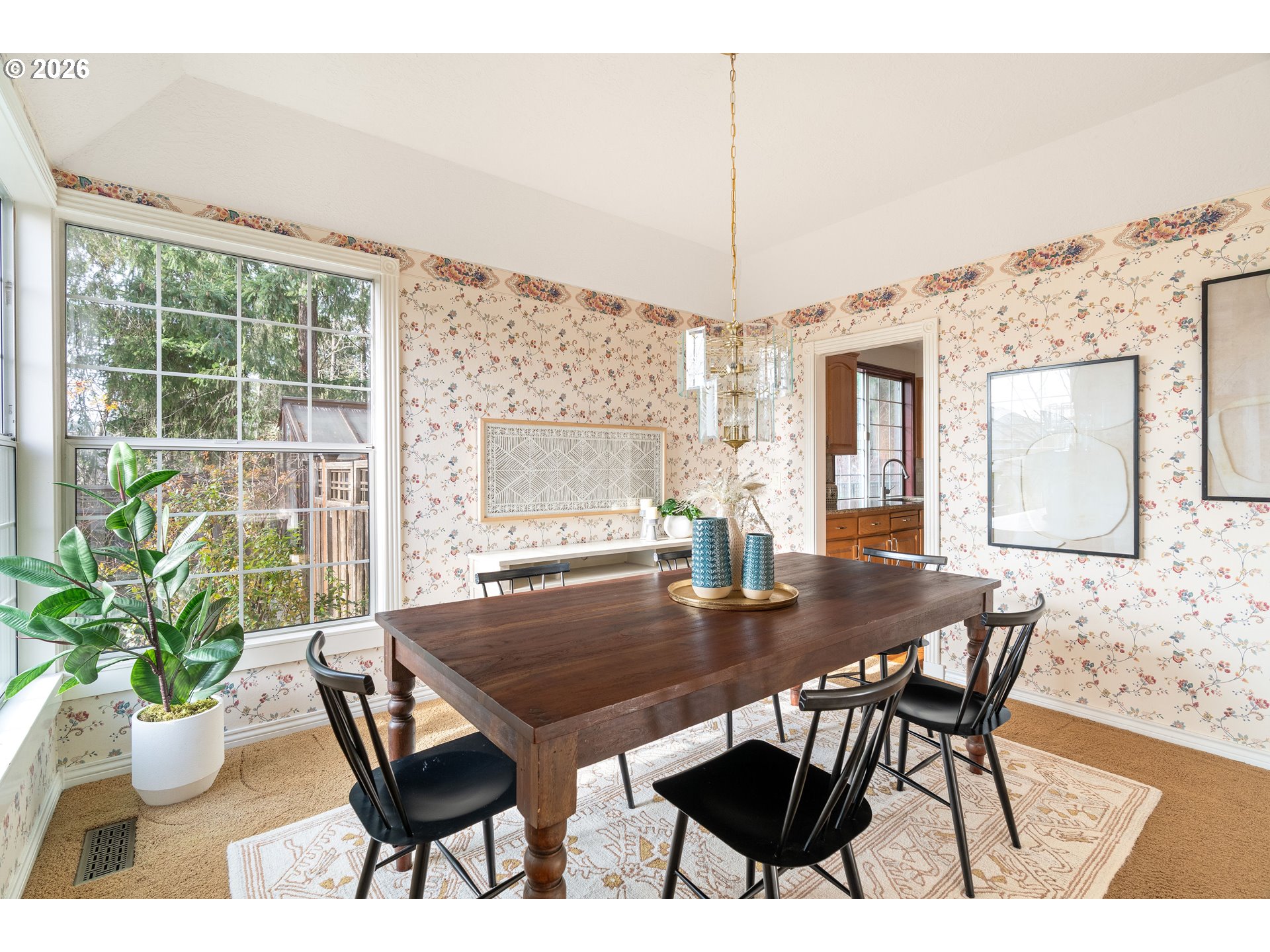 9985 Southwest 141st Avenue Beaverton, OR 97008 - Photo 11 of 47 a view of a dining room with furniture window and wooden floor