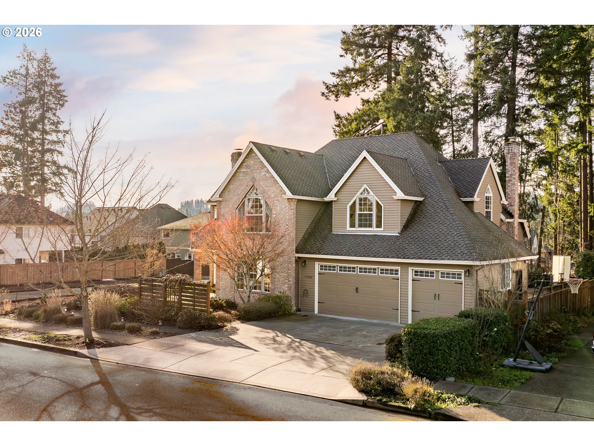 9985 Southwest 141st Avenue Beaverton, OR 97008 - Photo 2 of 47 a view of houses with a outdoor space