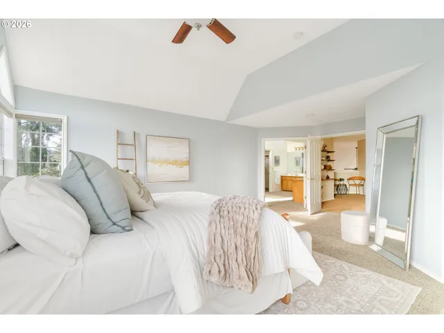a living room with a sink furniture and a kitchen view