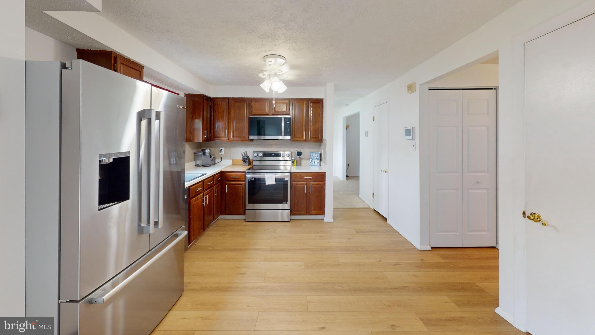 9622 Winands Road Randallstown, MD 21133 - Photo 3 of 30 New LVP floors and updated appliances