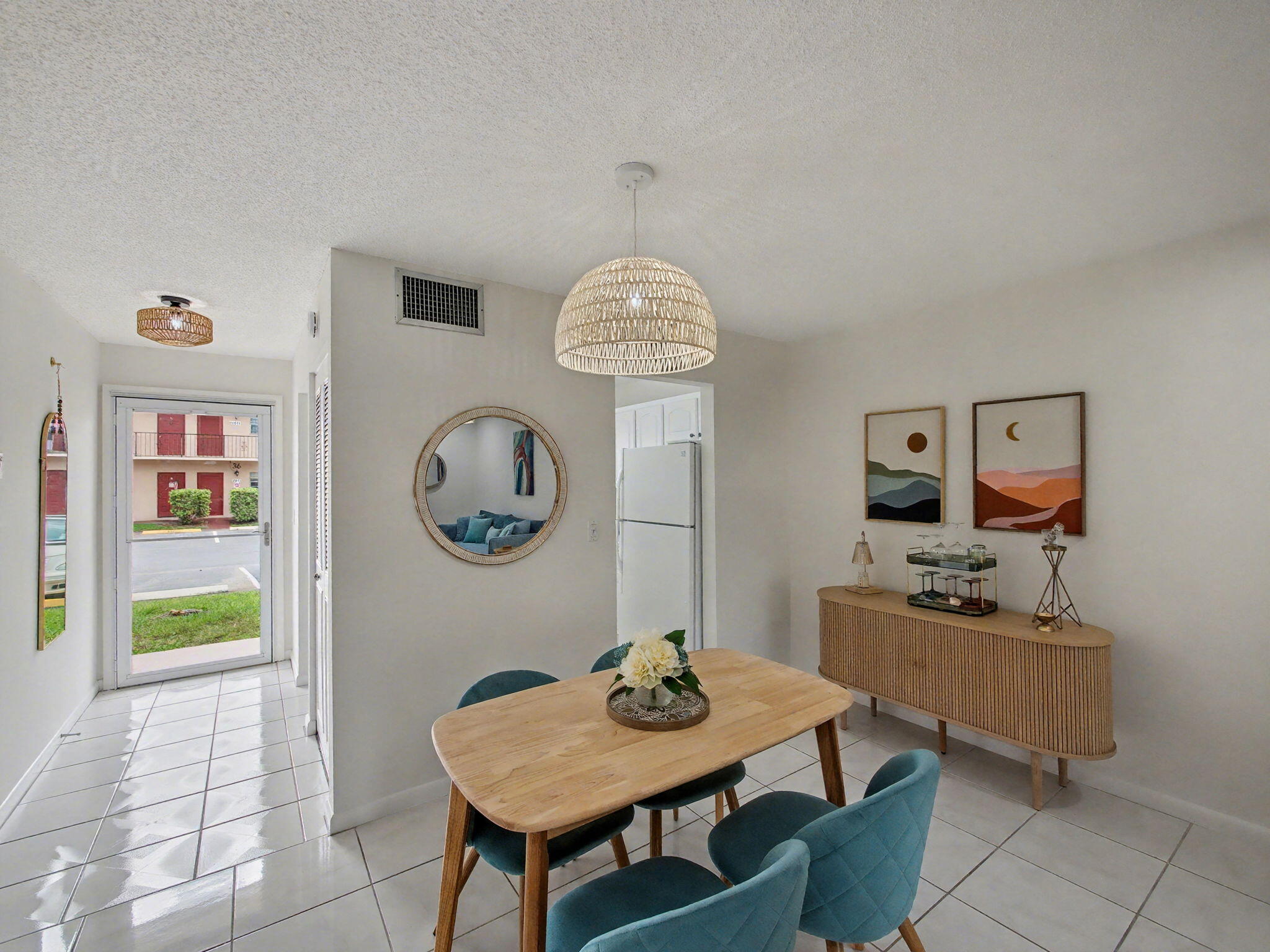 1967 Southwest Palm City Road, Unit 34C Stuart, FL 34994 - Photo 7 of 25 a view of a dining room with furniture and window