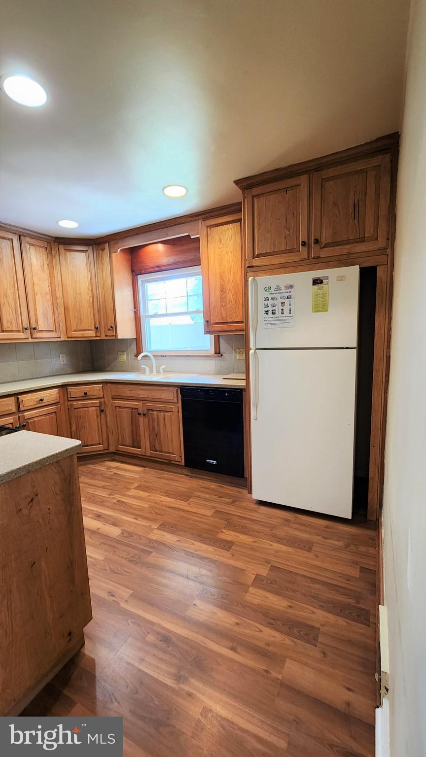 117 Girard Road North Glassboro, NJ 08028 - Photo 7 of 17 a view of kitchen and wooden floor