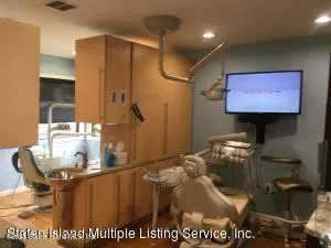 a bathroom with a sink a mirror and a shower