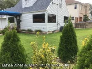 a view of a house with a garden