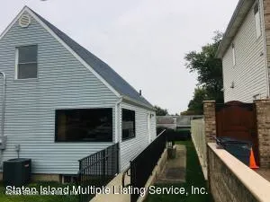 a view of a balcony from a ceiling fan