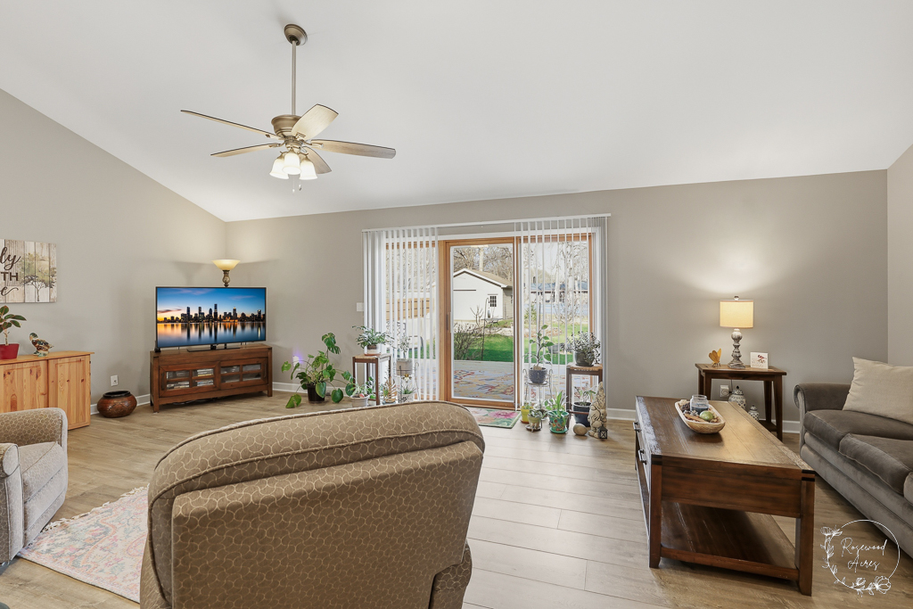 2853 Forsythia Lane St. Anne, IL 60964 - Photo 13 of 31 a living room with furniture and a flat screen tv