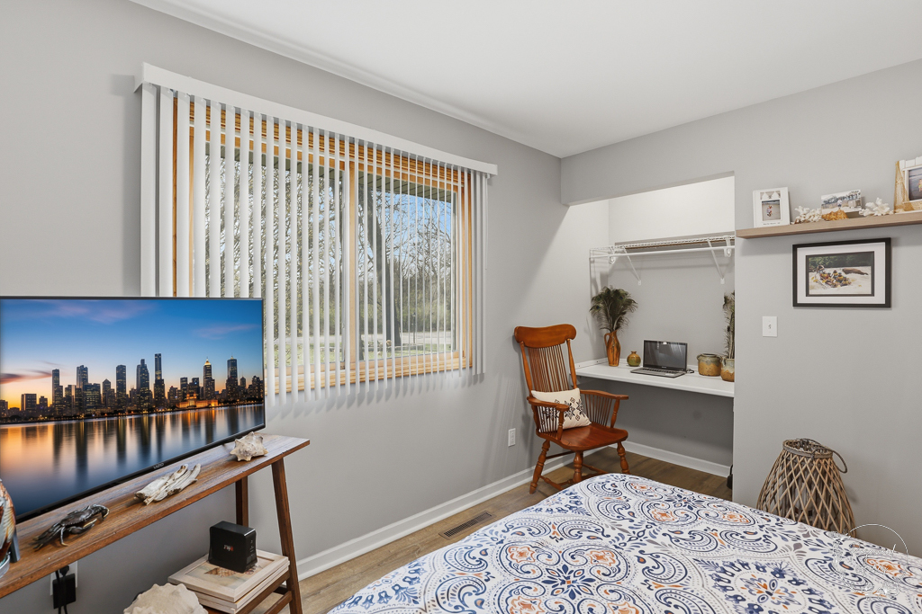 2853 Forsythia Lane St. Anne, IL 60964 - Photo 17 of 31 a bedroom with furniture and a window