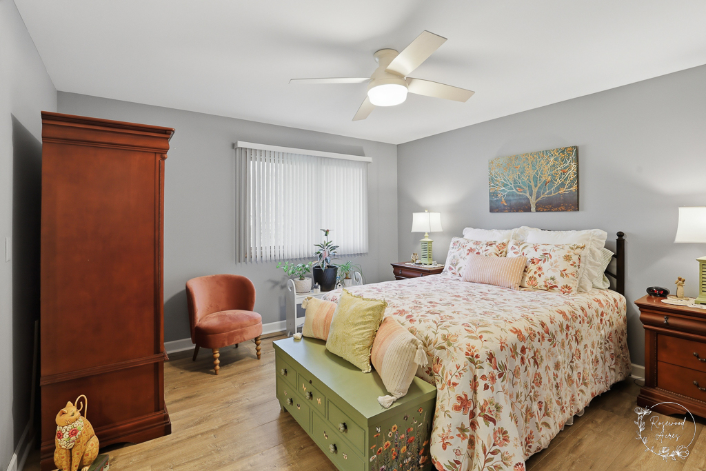 2853 Forsythia Lane St. Anne, IL 60964 - Photo 19 of 31 a bedroom with a bed and a couch