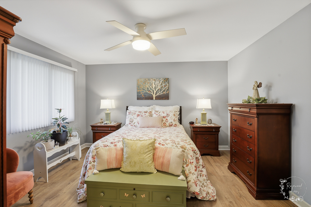 2853 Forsythia Lane St. Anne, IL 60964 - Photo 22 of 31 a bedroom with a bed and wooden floor