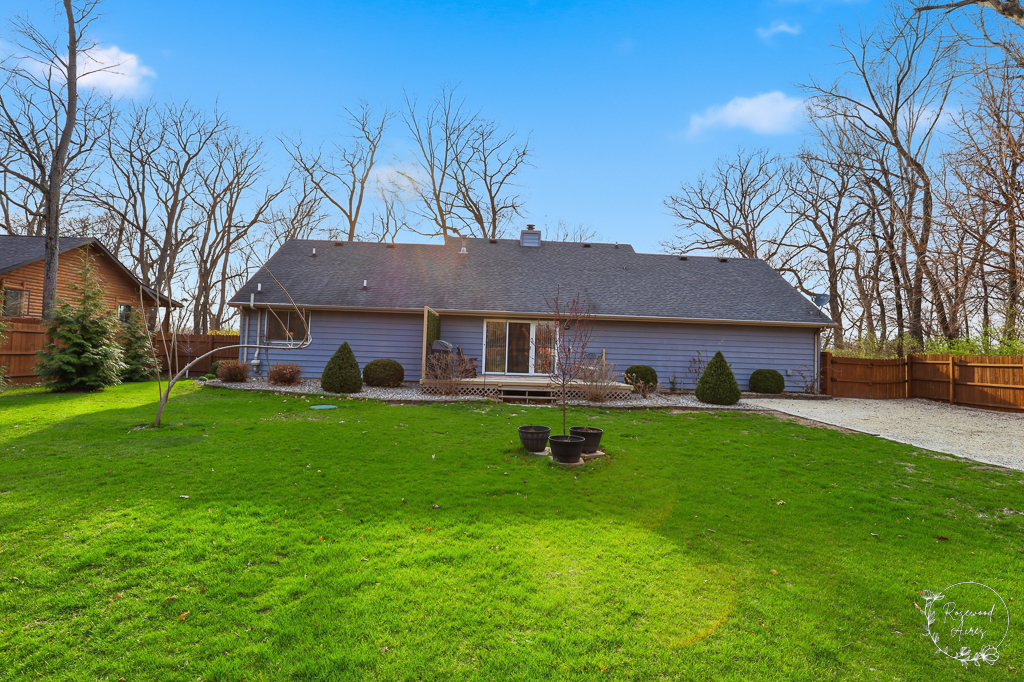 2853 Forsythia Lane St. Anne, IL 60964 - Photo 29 of 31 a front view of house with yard and green space