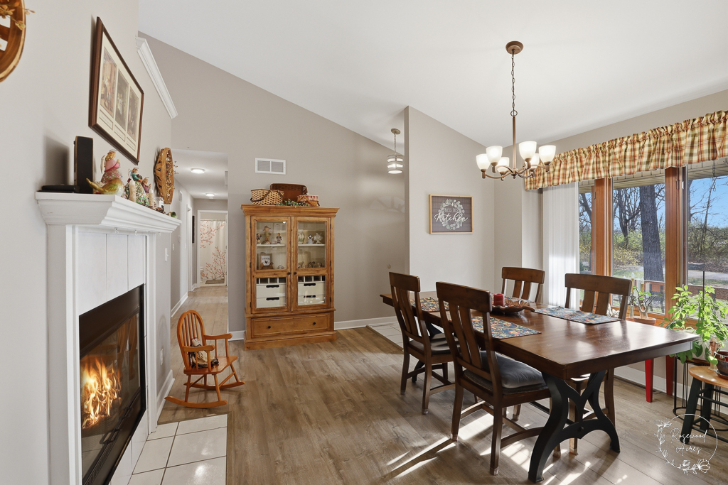 2853 Forsythia Lane St. Anne, IL 60964 - Photo 6 of 31 a view of a livingroom with furniture and a chandelier