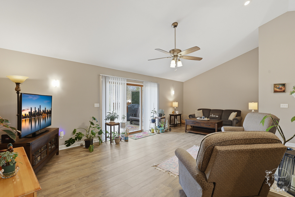 2853 Forsythia Lane St. Anne, IL 60964 - Photo 9 of 31 a living room with furniture and a wooden floor