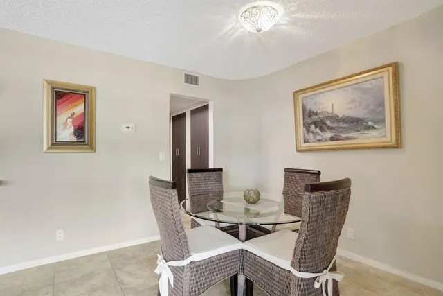 a en suite bathroom with a sink and a mirror