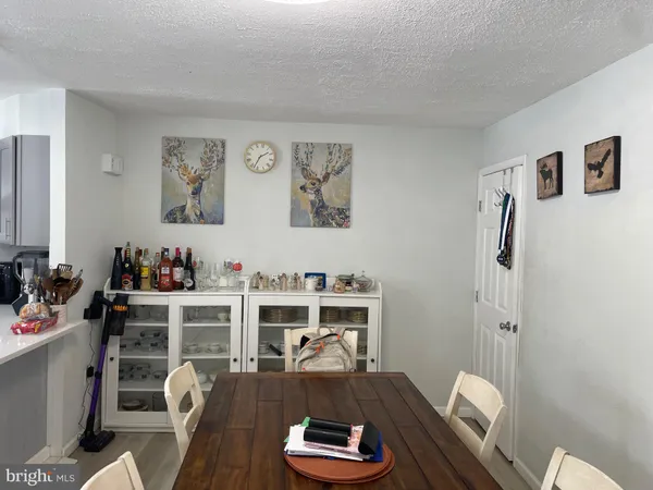 a view of a workspace with furniture