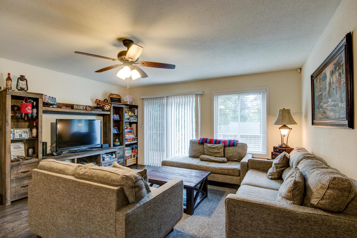 23832 Old Madrone Road Pioneer, CA 95666 - Photo 21 of 48 a living room with furniture and a flat screen tv
