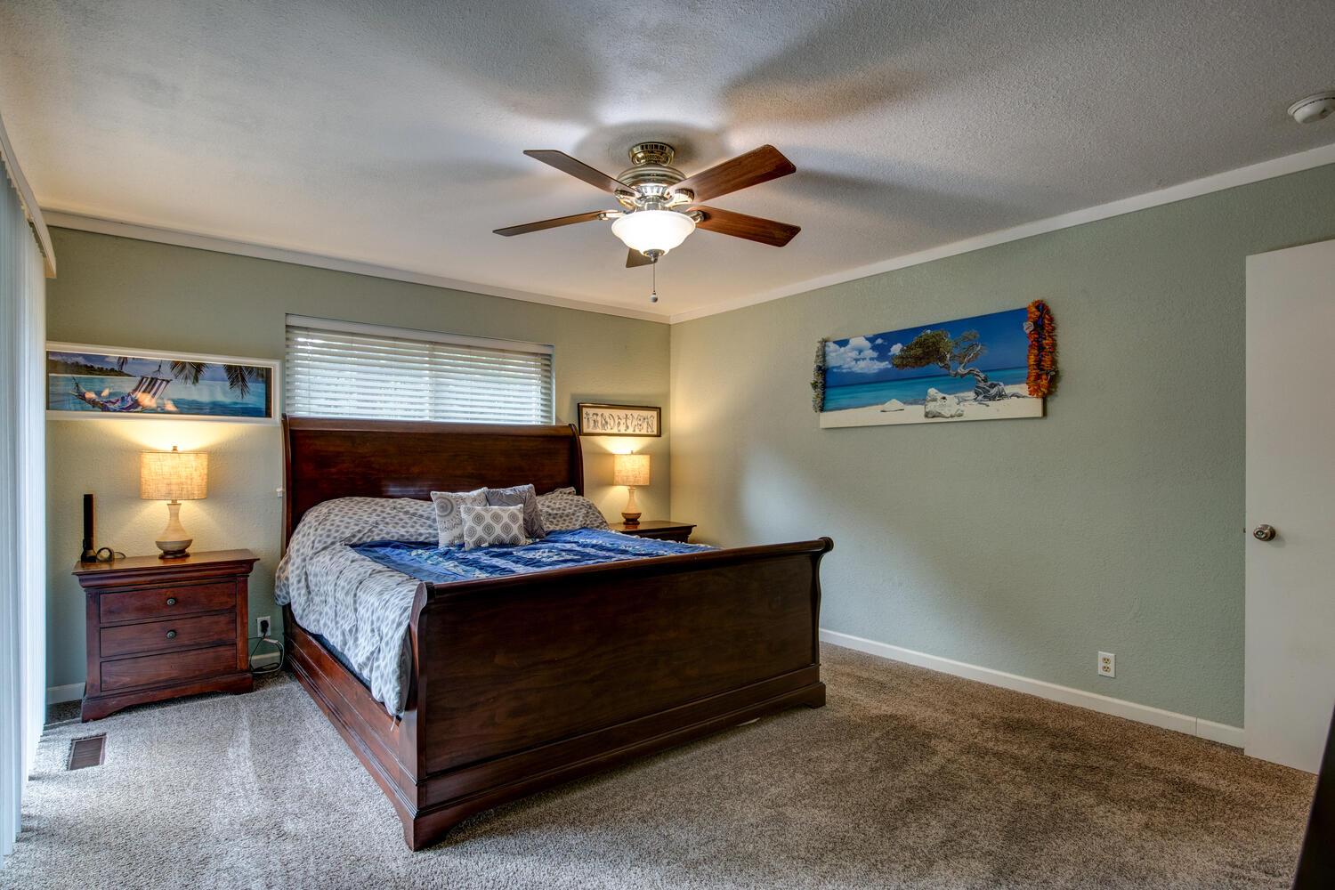 23832 Old Madrone Road Pioneer, CA 95666 - Photo 24 of 48 a bedroom with a bed and a chandelier