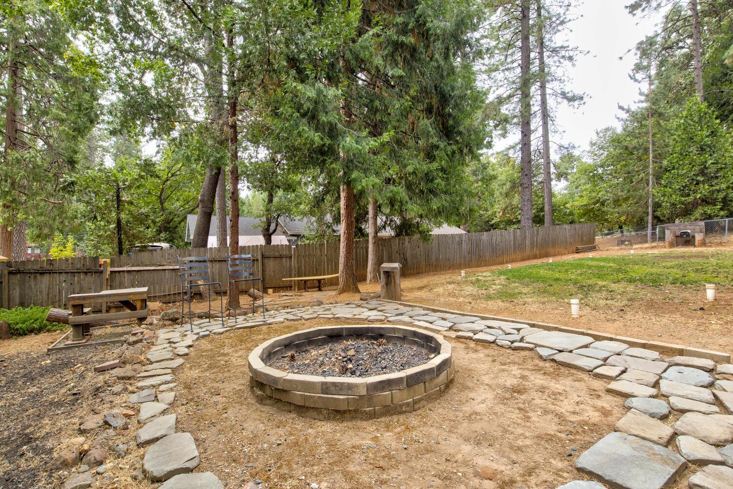 23832 Old Madrone Road Pioneer, CA 95666 - Photo 31 of 48 a view of a swimming pool with a patio