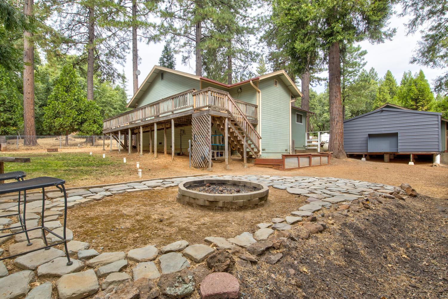 23832 Old Madrone Road Pioneer, CA 95666 - Photo 32 of 48 a front view of a house with a yard