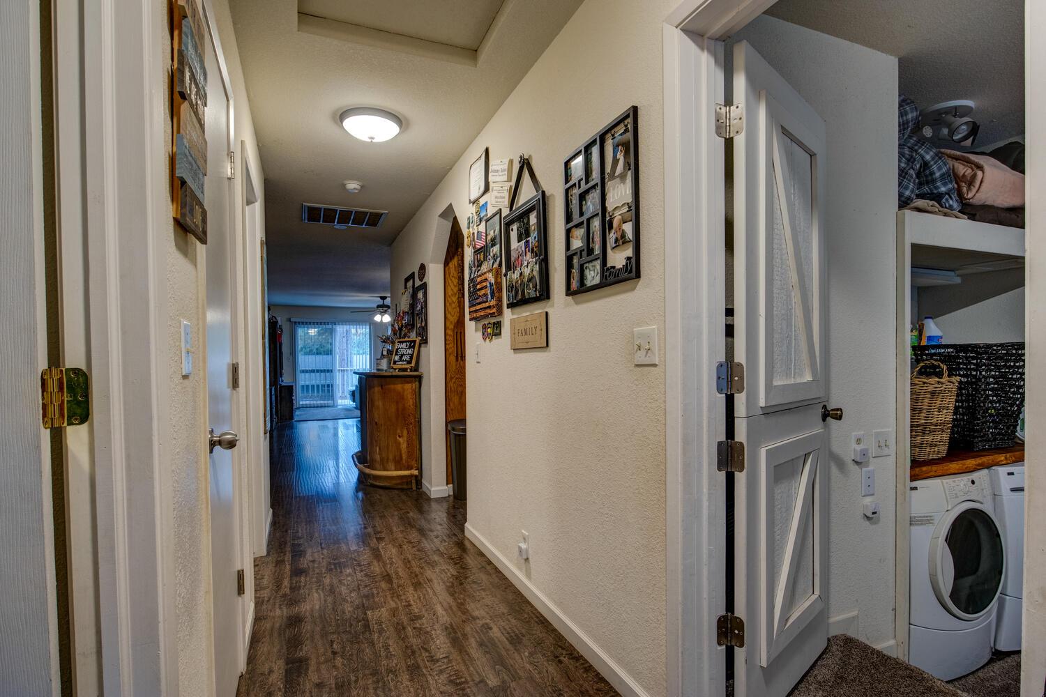 23832 Old Madrone Road Pioneer, CA 95666 - Photo 6 of 48 a view of a hallway with washer and dryer