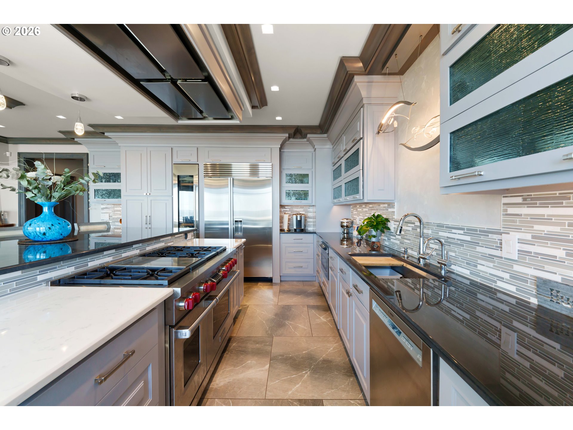 2488 Beach Loop Road Bandon, OR 97411 - Photo 29 of 48 a kitchen with granite countertop a sink a counter top space