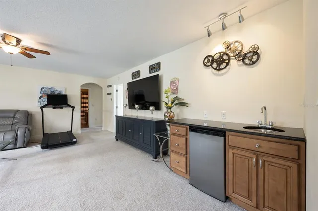 a kitchen with a sink and a stove