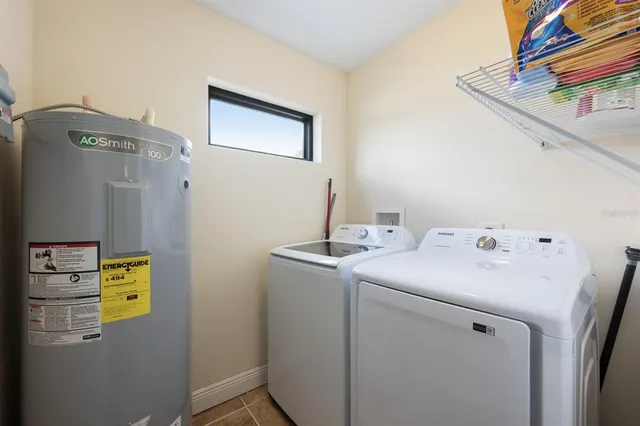 a utility room with dryer and washer