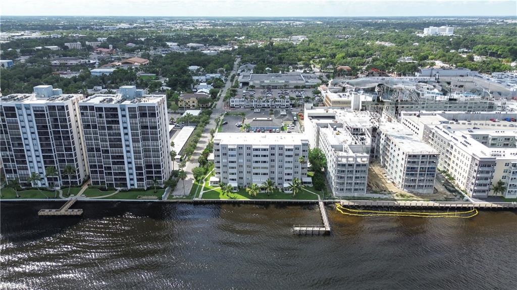 1900 Clifford Street, Unit 301 Fort Myers, FL 33901 - Photo 29 of 35 Drone / aerial view of a large body of water