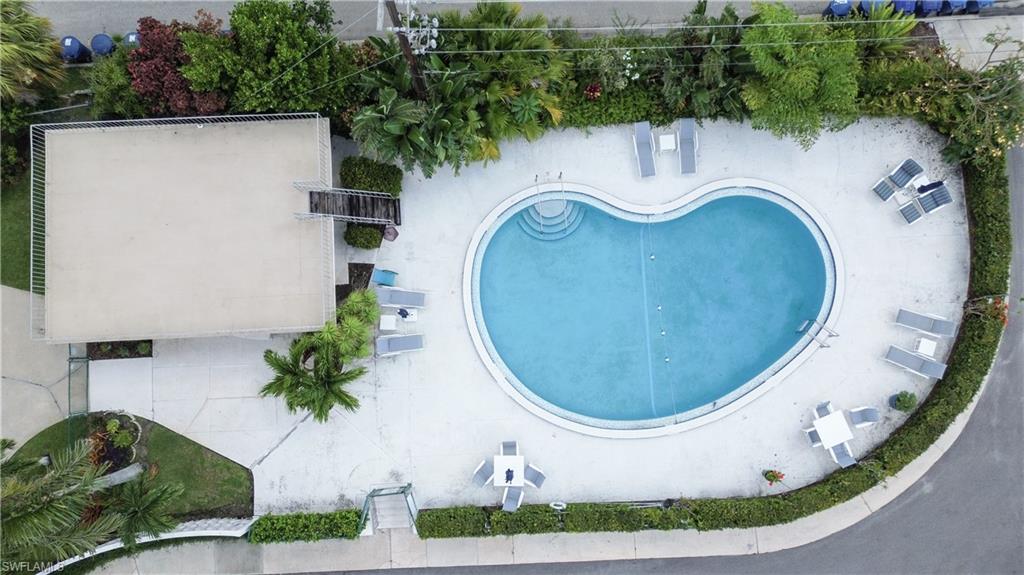 1900 Clifford Street, Unit 301 Fort Myers, FL 33901 - Photo 34 of 35 Drone / aerial view of a pool area