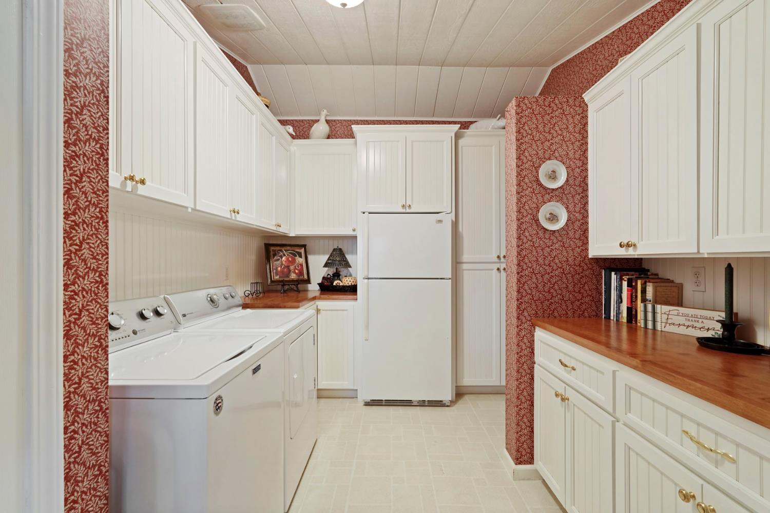 450 West Turner Road Lodi, CA 95242 - Photo 18 of 63 Large laundry room with extra storage and a second refrigerator.