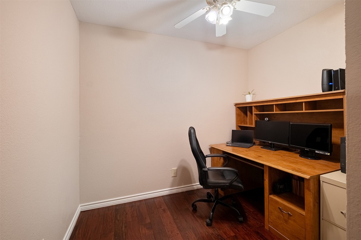280 Sunset Terrace Cedar Park, TX 78613 - Photo 18 of 38 a view of a workspace with furniture and wooden floor