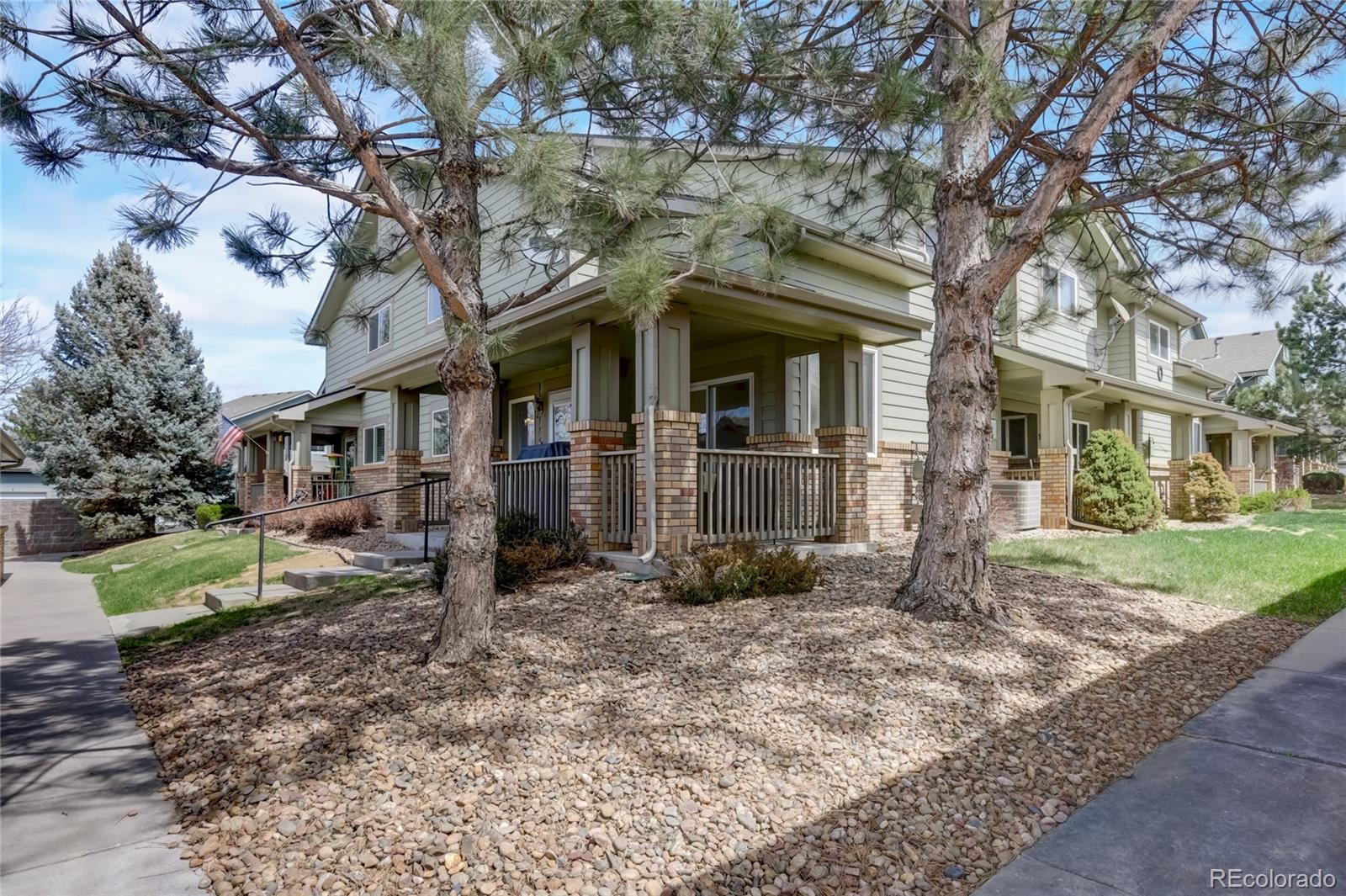 2900 Purcell Street, Unit O4 Brighton, CO 80601 - Photo 1 of 28 front view of a house with a yard