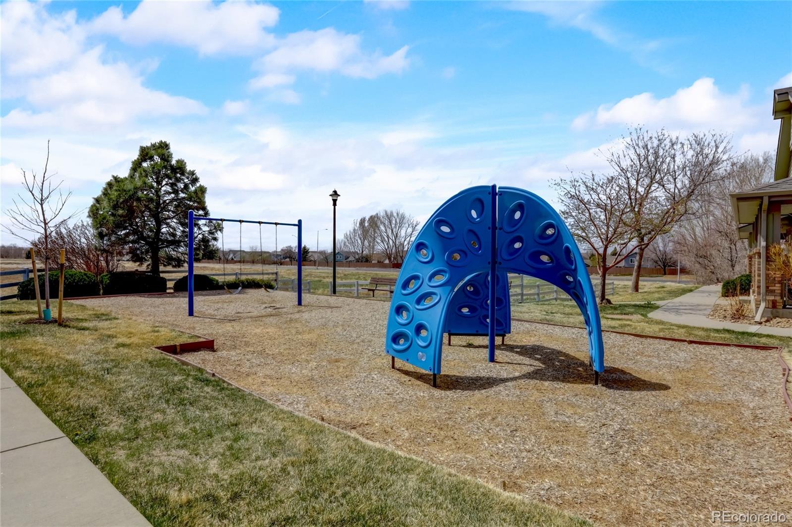 2900 Purcell Street, Unit O4 Brighton, CO 80601 - Photo 26 of 28 a view of outdoor space with playground and green space