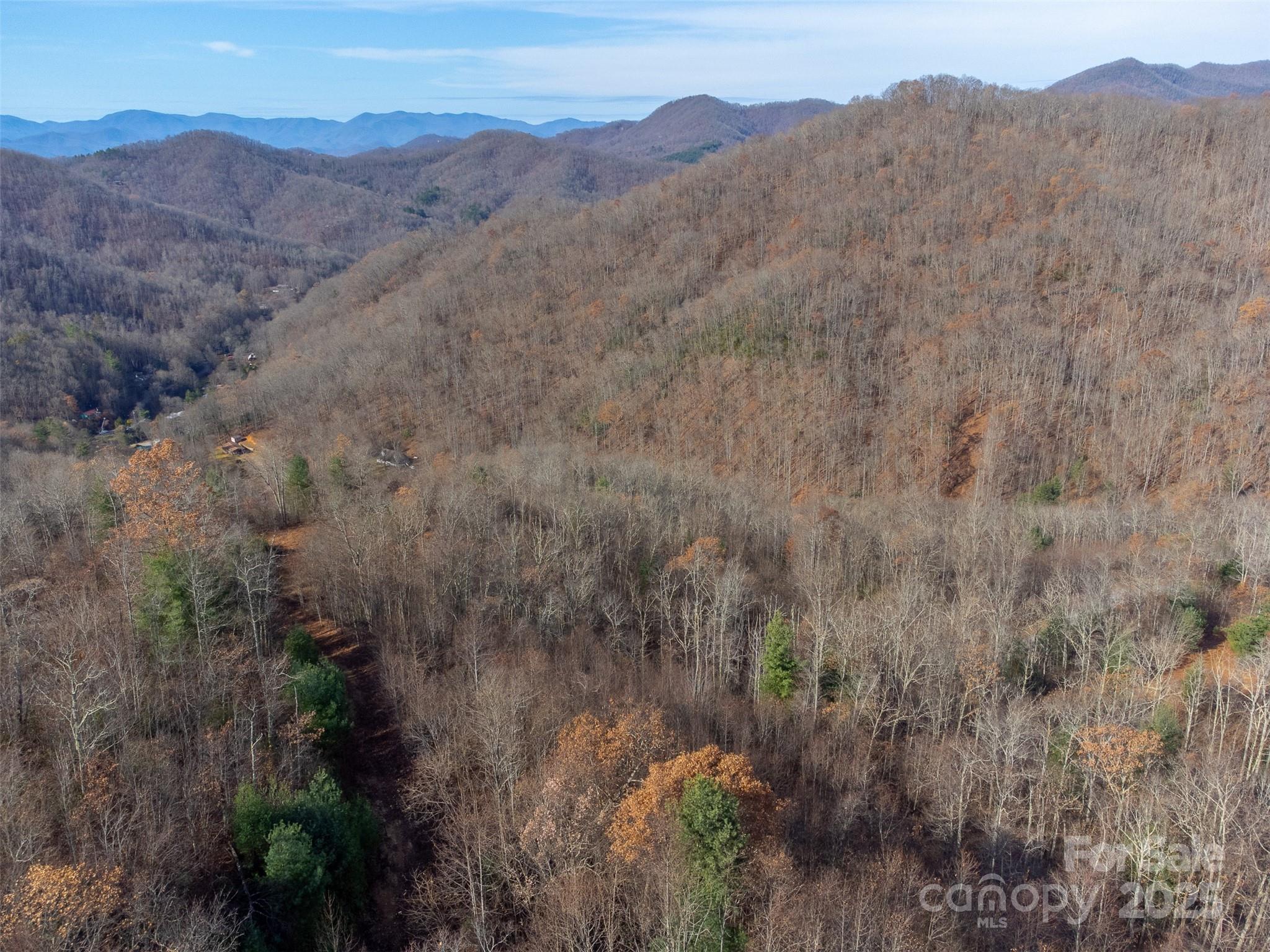 0 Garnet Road Sylva, NC 28779 - Photo 29 of 46 a view of a mountain range with trees in the background