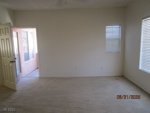667 Solitude Point Avenue Henderson, NV 89012 - Photo 13 of 22 Empty room featuring light colored carpet