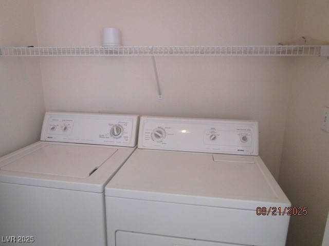 667 Solitude Point Avenue Henderson, NV 89012 - Photo 20 of 22 Laundry area with separate washer and dryer