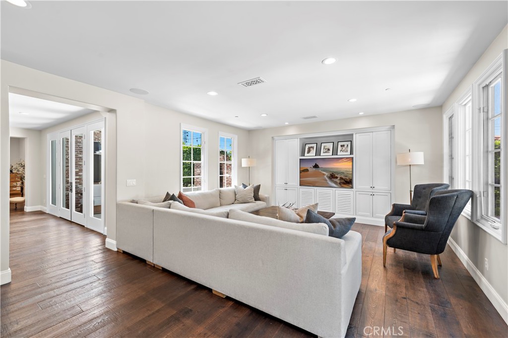 5 Connor Court Ladera Ranch, CA 92694 - Photo 16 of 63 a living room with furniture and wooden floor