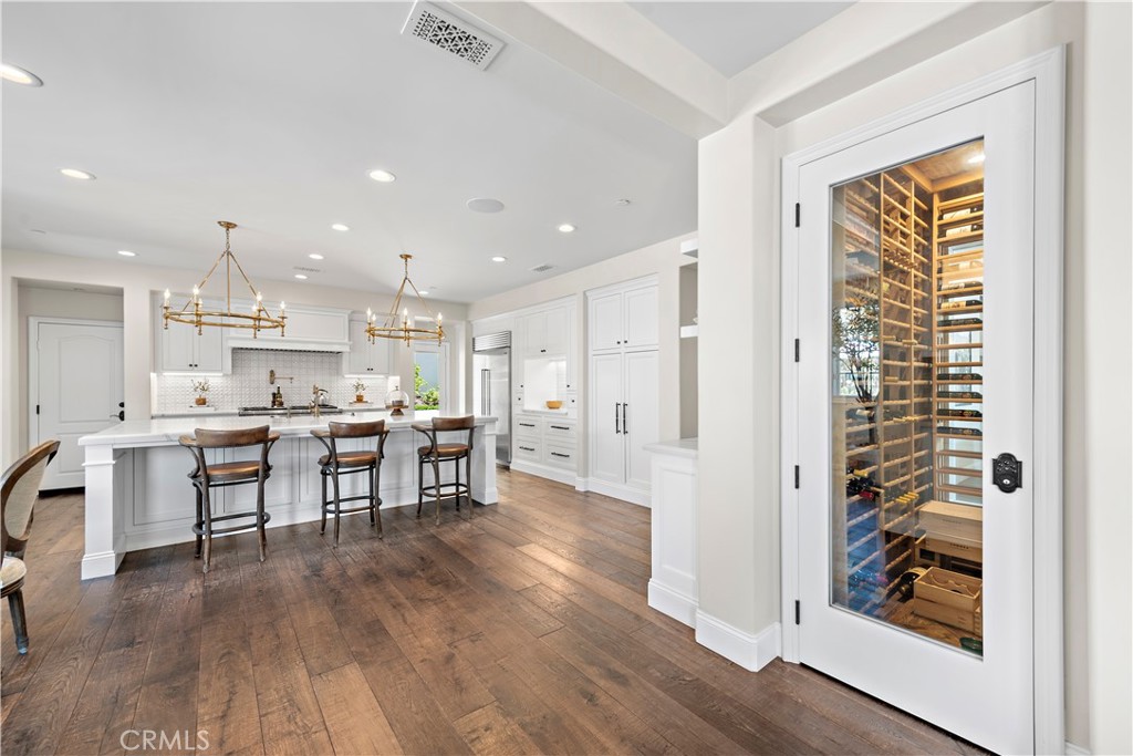 5 Connor Court Ladera Ranch, CA 92694 - Photo 18 of 63 a kitchen with a table and chairs in it