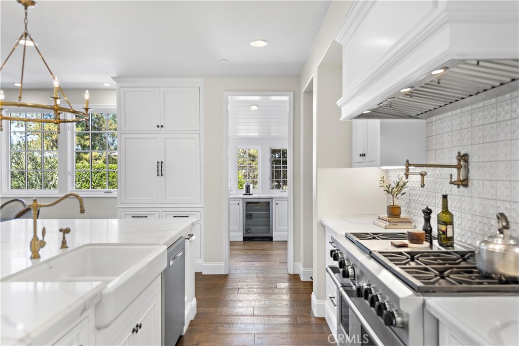 5 Connor Court Ladera Ranch, CA 92694 - Photo 23 of 63 a kitchen with stainless steel appliances granite countertop a sink stove and cabinets