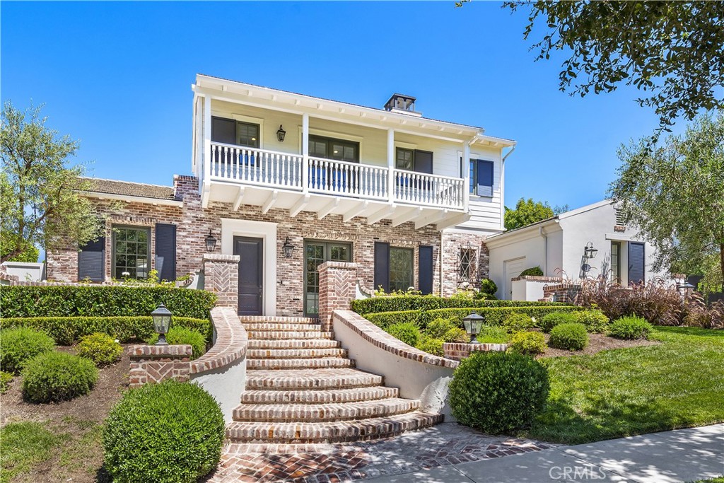 5 Connor Court Ladera Ranch, CA 92694 - Photo 3 of 63 a front view of a house with a yard
