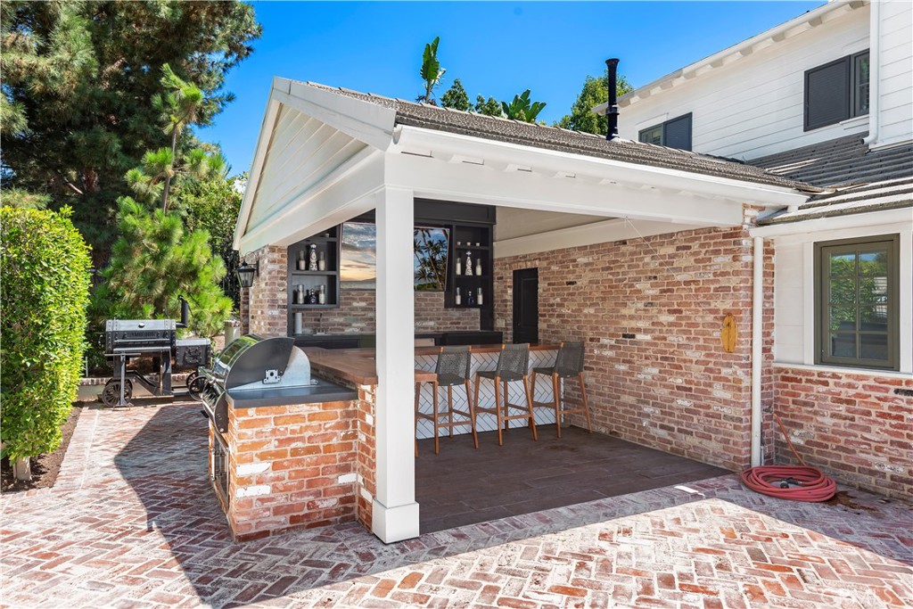 5 Connor Court Ladera Ranch, CA 92694 - Photo 44 of 63 a view of a patio with table and chairs and potted plants