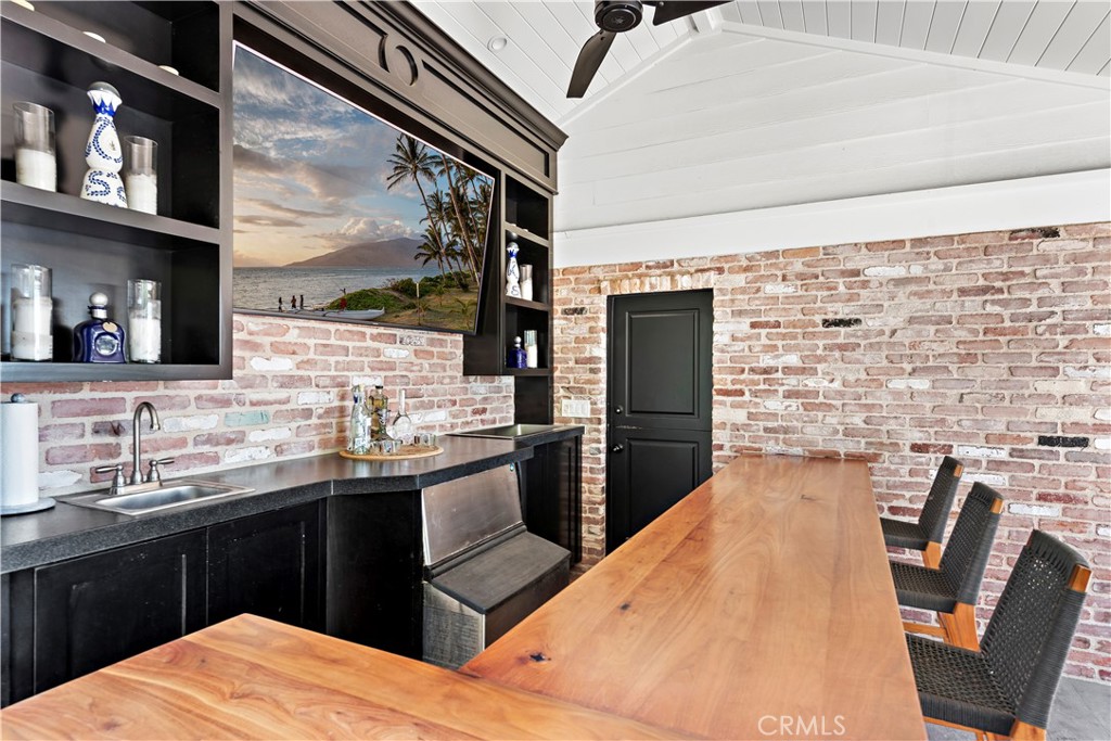 5 Connor Court Ladera Ranch, CA 92694 - Photo 45 of 63 a kitchen with stainless steel appliances kitchen island granite countertop a sink dishwasher stove and refrigerator