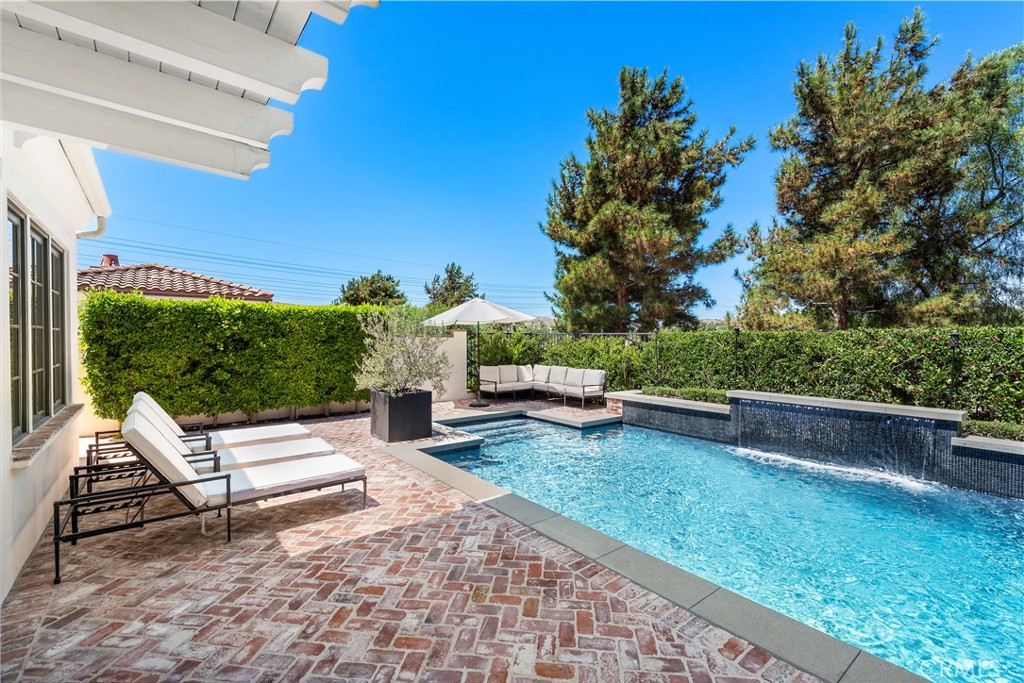 5 Connor Court Ladera Ranch, CA 92694 - Photo 48 of 63 a view of a bench in the backyard of a house