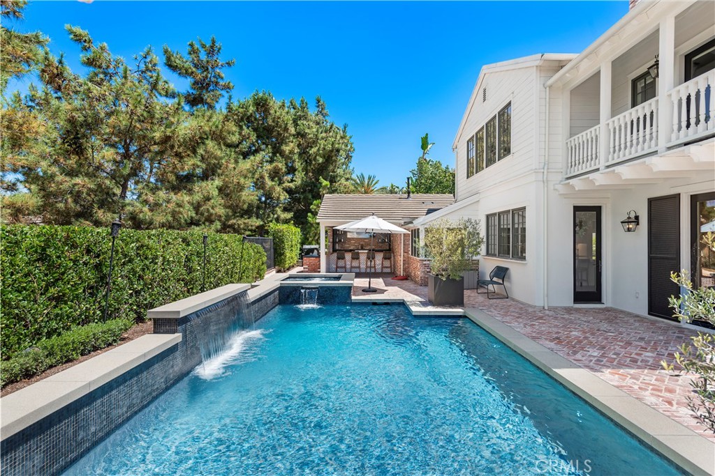 5 Connor Court Ladera Ranch, CA 92694 - Photo 49 of 63 a view of a house with backyard sitting area and garden