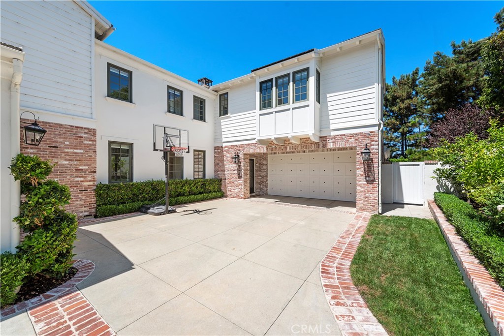 5 Connor Court Ladera Ranch, CA 92694 - Photo 51 of 63 a front view of a house with a yard and garage