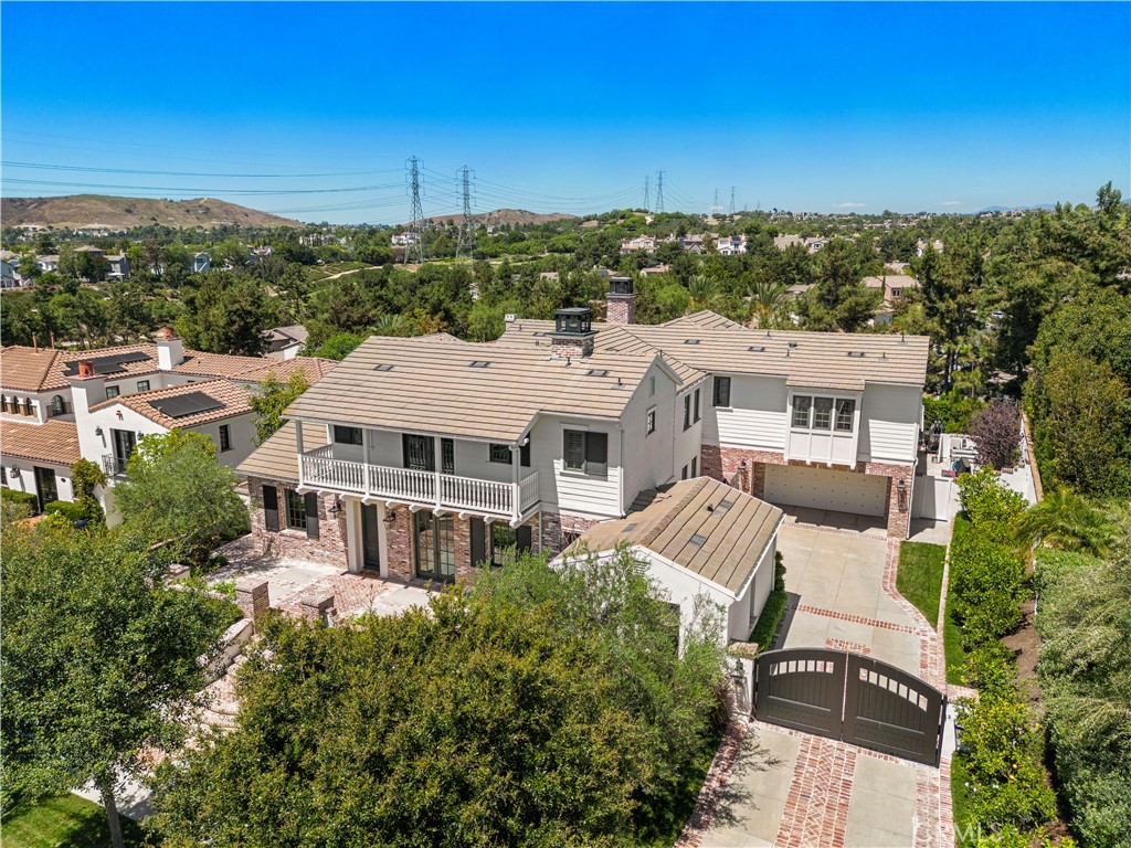 5 Connor Court Ladera Ranch, CA 92694 - Photo 52 of 63 an aerial view of a house with a yard and lake view