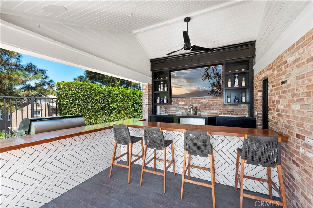 5 Connor Court Ladera Ranch, CA 92694 - Photo 8 of 63 a view of a chairs and table in patio with wooden floor
