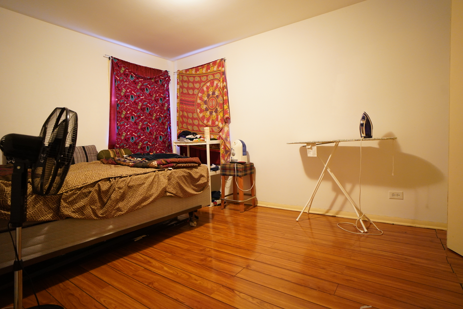 8518 West Rascher Avenue, Unit 2 Chicago, IL 60656 - Photo 8 of 8 a bed sitting in a bedroom next to a window